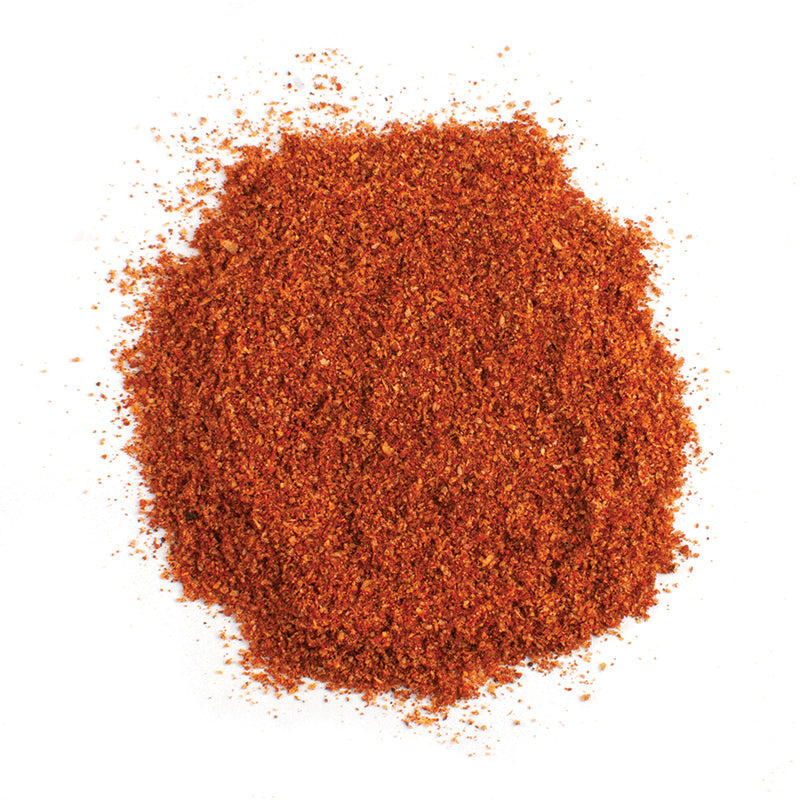 ADOBO SEASONING - 10 lb bag / box each, a vibrant pile of flavorful seasoning for cooking.