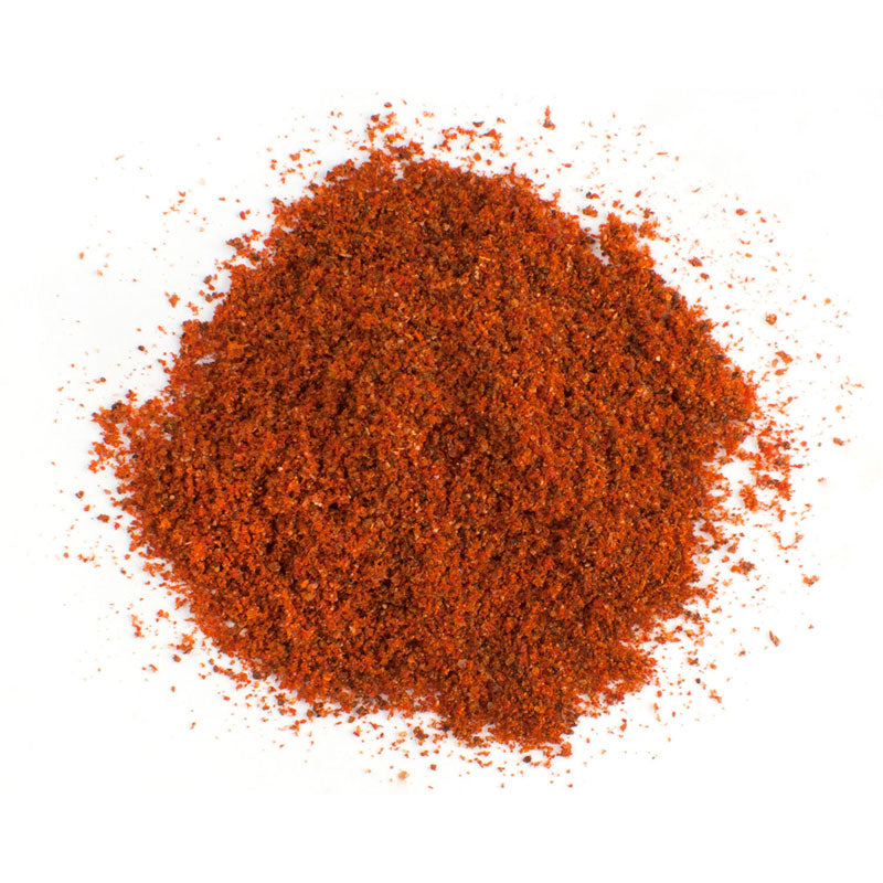 BASQUE SEASONING - 10 lb bag / box each, a vibrant blend of smoky, sweet, and savory spices in a pile.