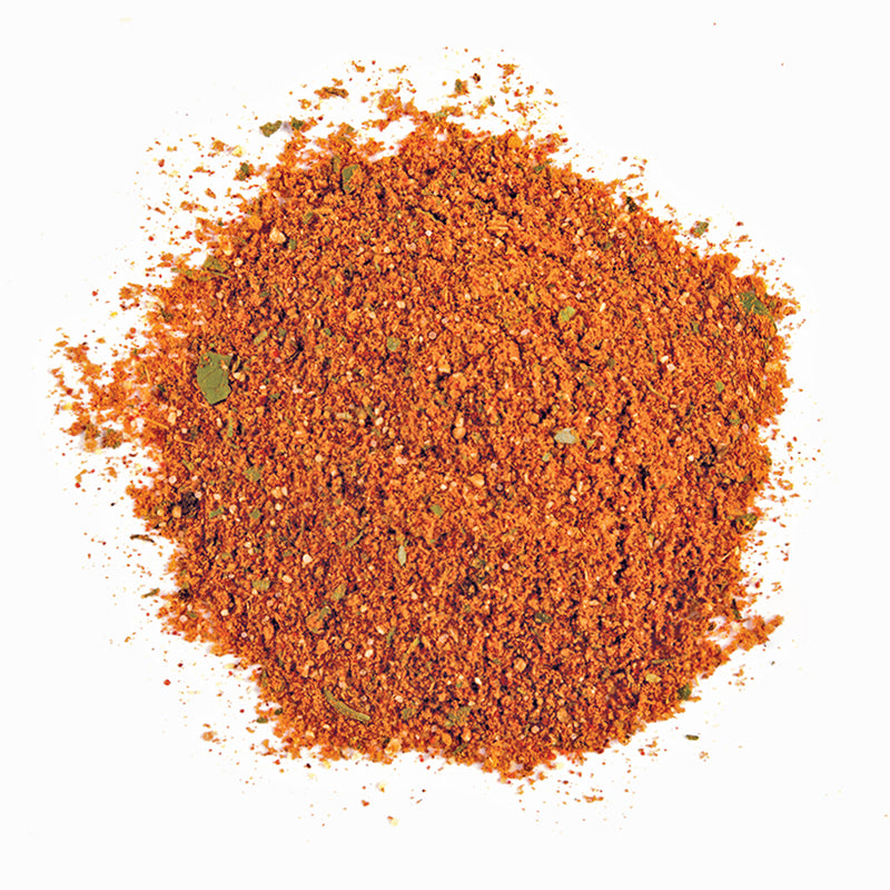 CHERMOULA SEASONING - 10 lb bag / box, a vibrant blend of spices in a heap, ideal for enhancing North African dishes.