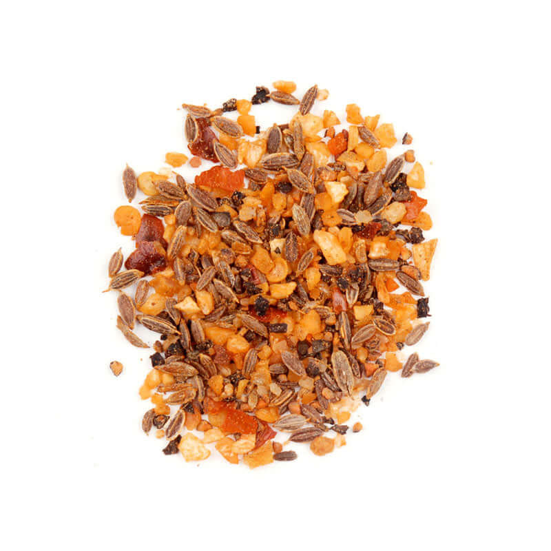 Spicy Garlic Steak Seasoning featuring a blend of spices on a white background.