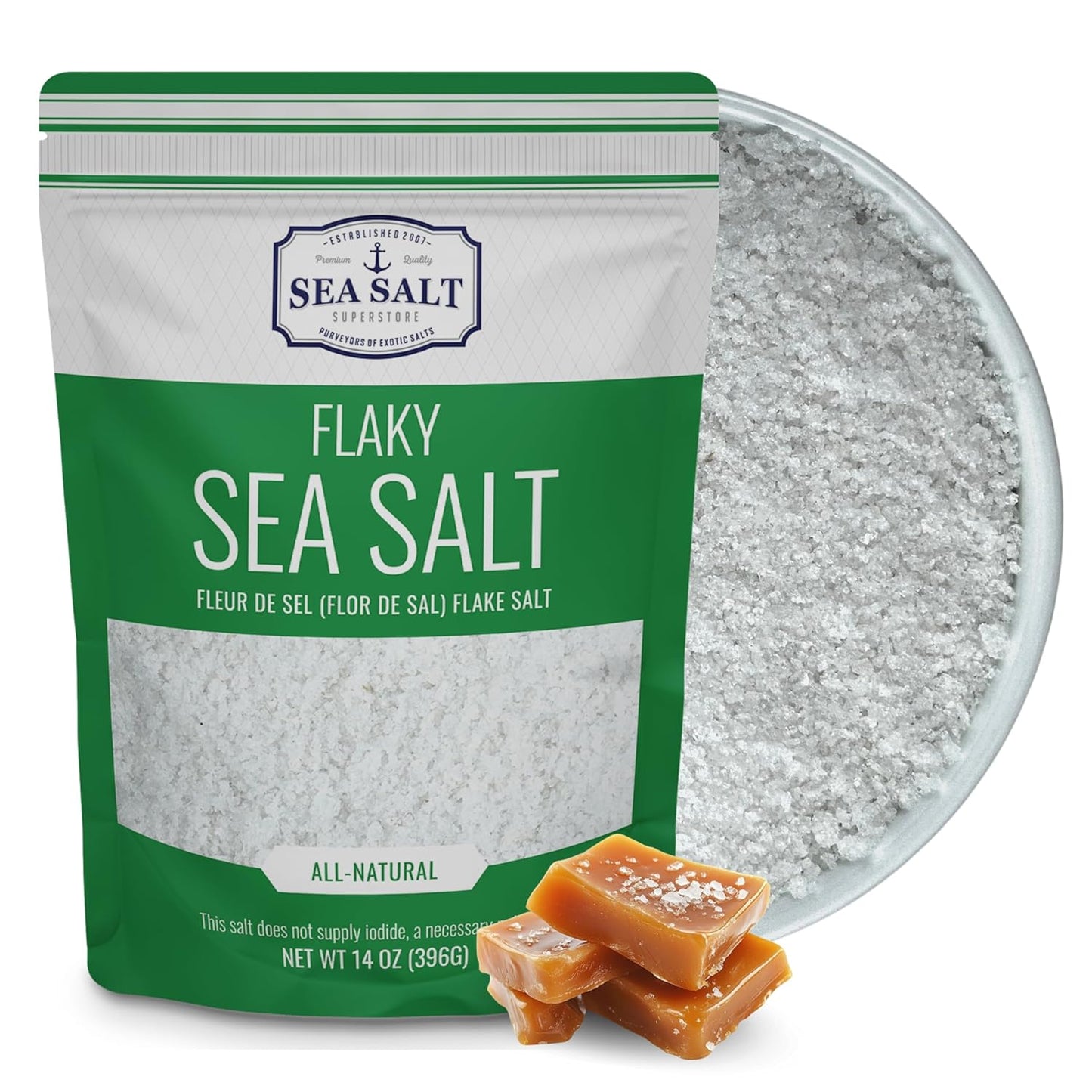 Mini Flake Sea Salt - 14 oz Pouch with flaky sea salt in a bowl and caramel pieces for culinary use.