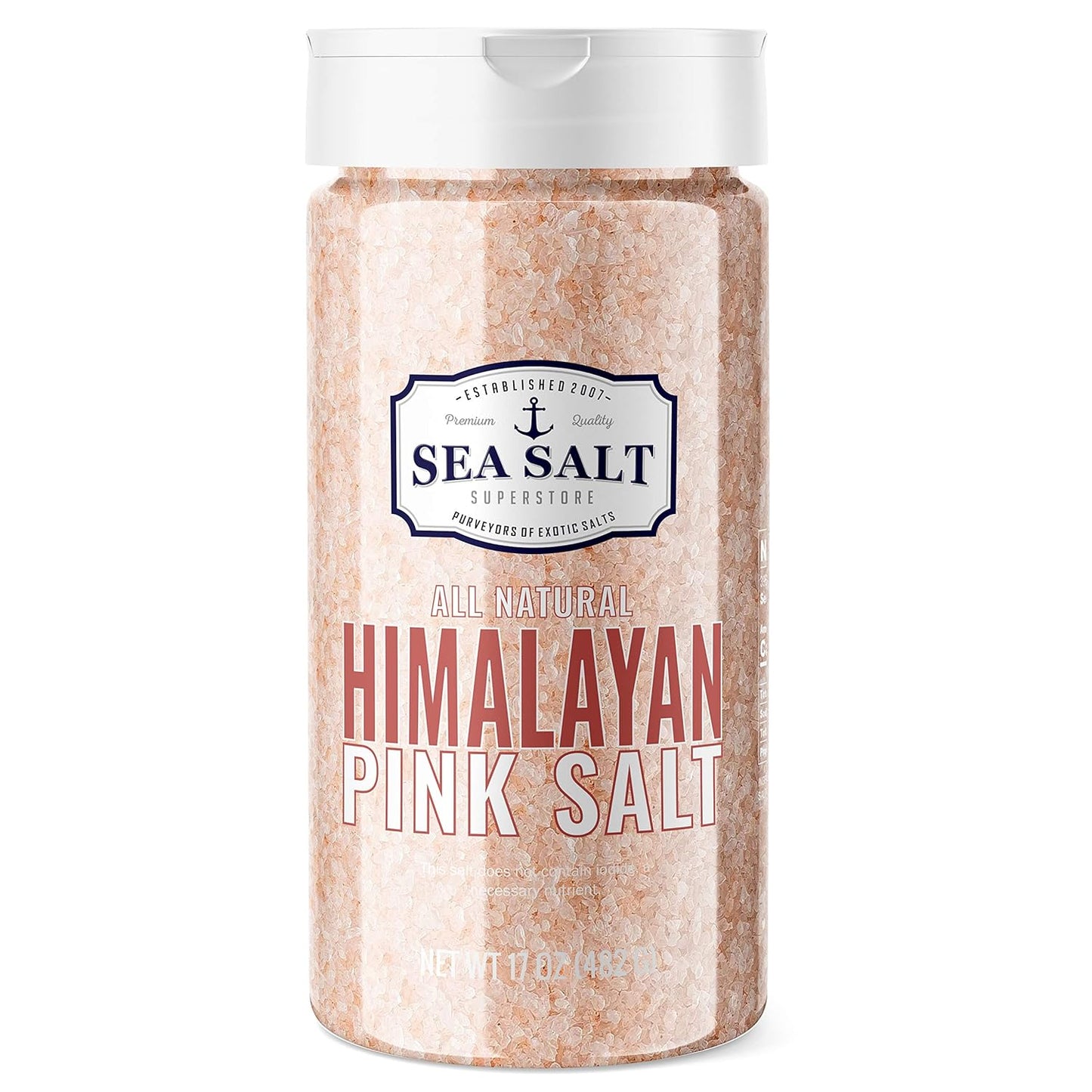 Pink Himalayan Salt Fine Grain - 16 oz Shaker seen in a clear container with a white top.