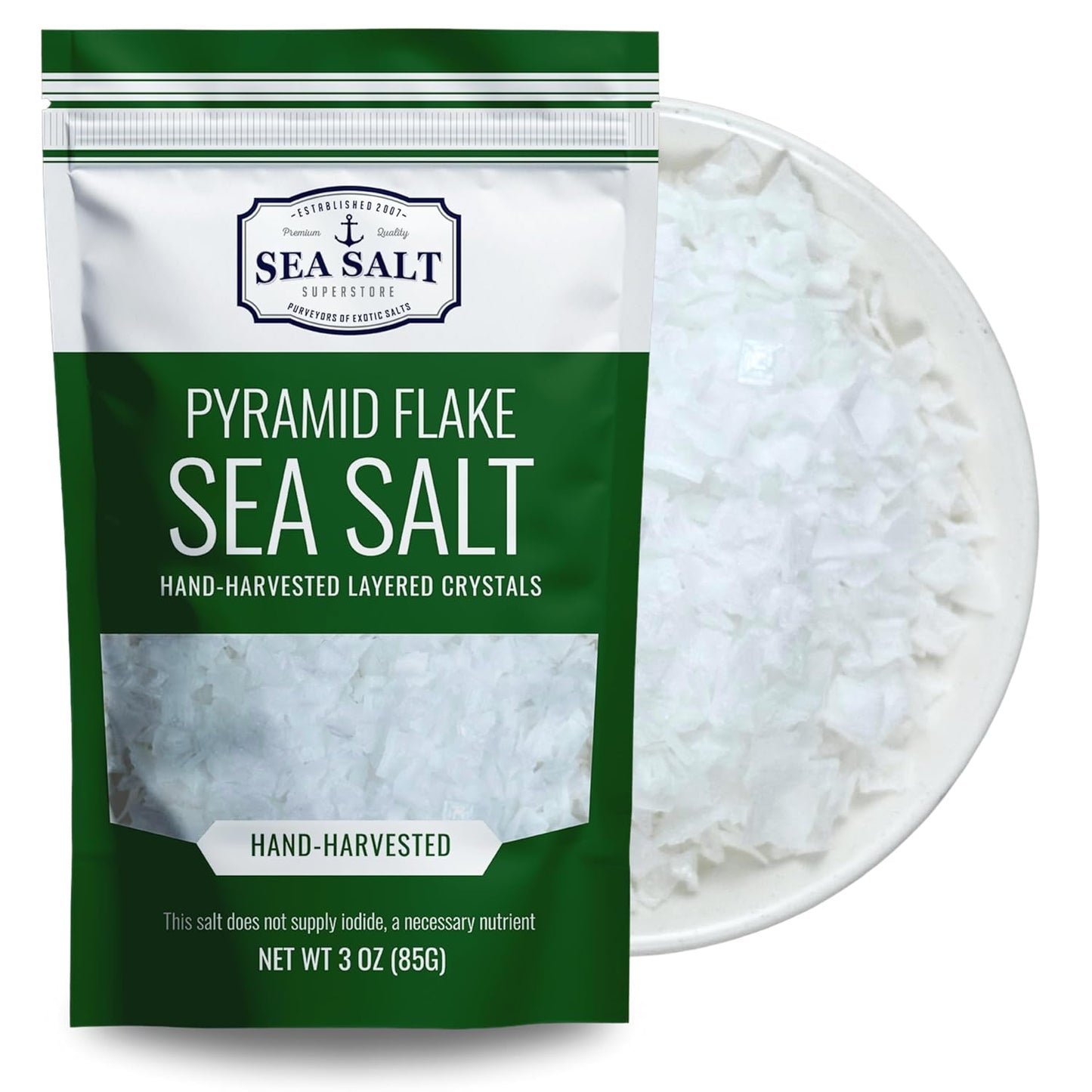 Pyramid Flake Sea Salt - 3 oz Pouch with hand-harvested layered crystals in a white bowl.