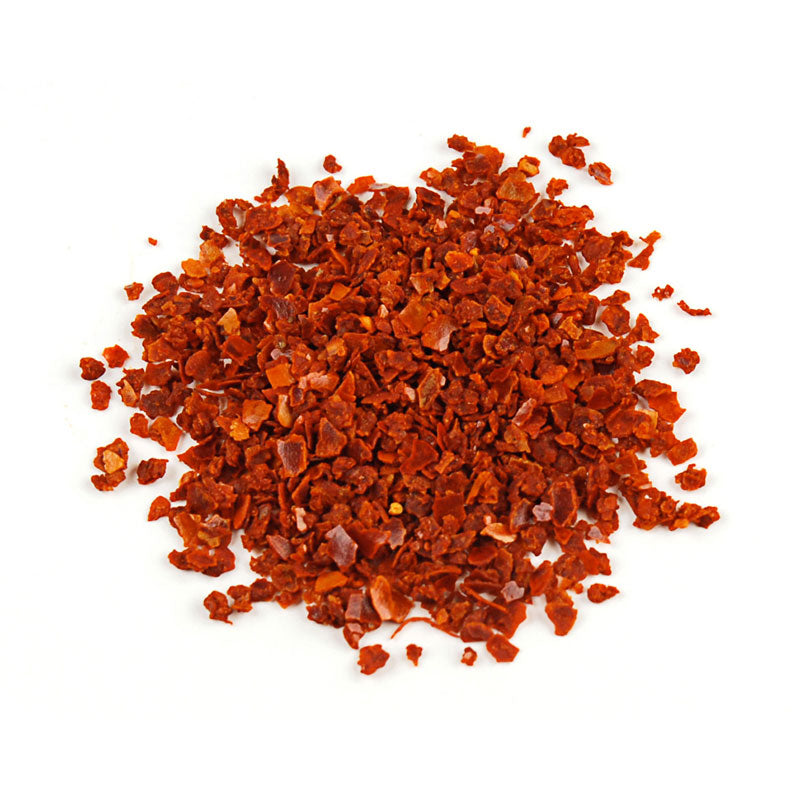 ALEPPO STYLE RED CHILE FLAKES - 50 lb bag / box each on a white background, showcasing vibrant red flakes.