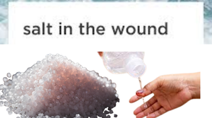 Salt and Wound Healing: Does It Help? Image showing salt and a hand applying saline to a wound.