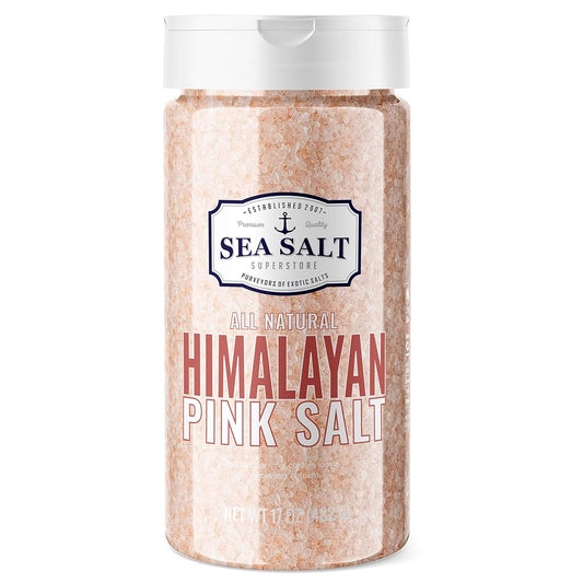 Pink Himalayan Salt Fine Grain - 16 oz Shaker seen in a clear container with a white top.